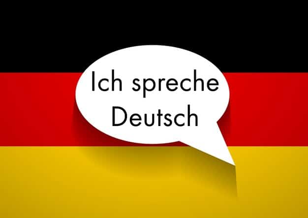 Exemple de phrase au présent en allemand : Ich spreche Deutsch, avec fond de drapeau allemand